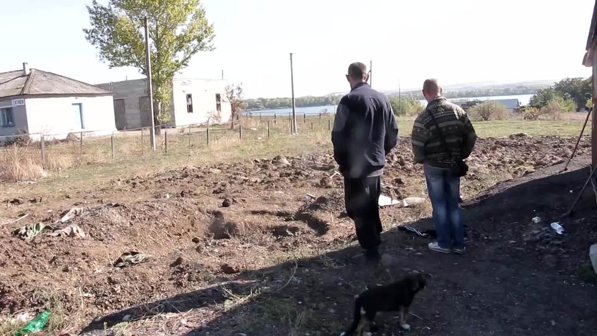 Ukraine: Kiev under fire as another mass grave uncovered in Donetsk *GRAPHIC*