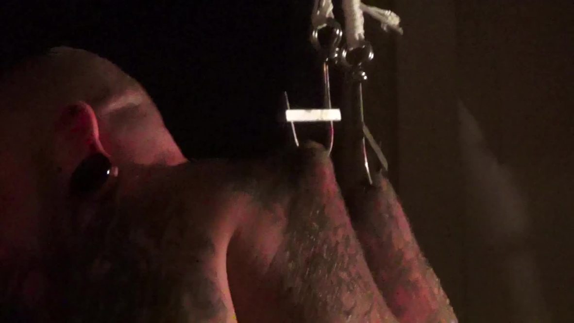 Germany: See these men get HIGH on pain during suspension show