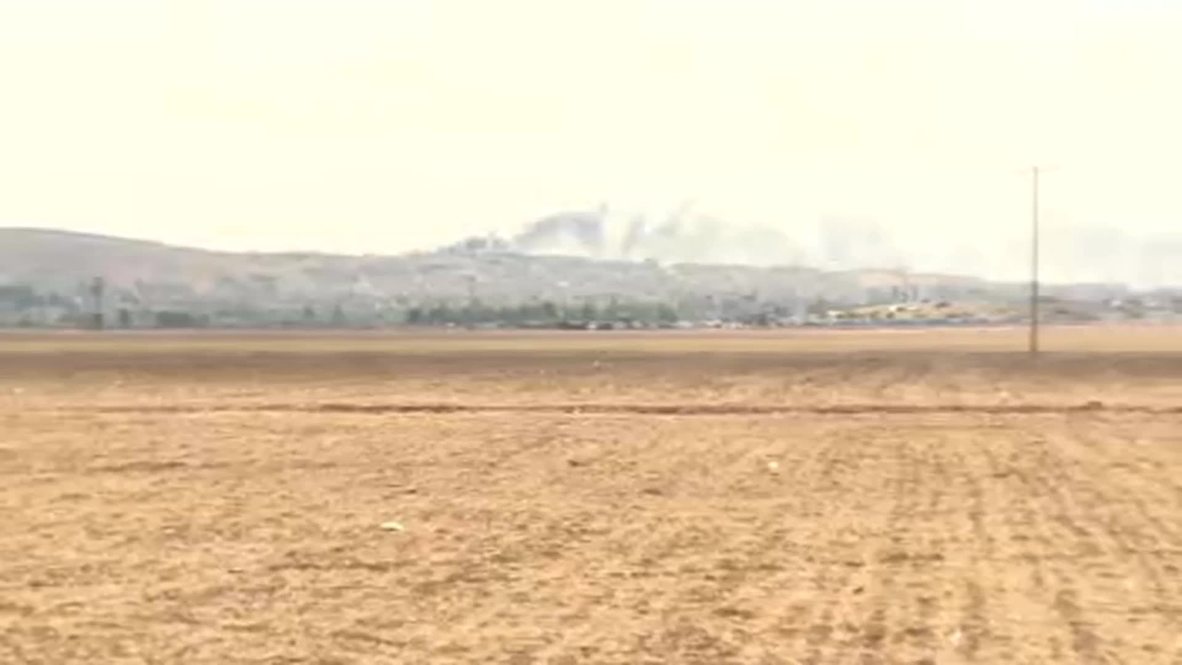 Turkey: Smoke rises over under siege Kobane as US-led airstrikes continue