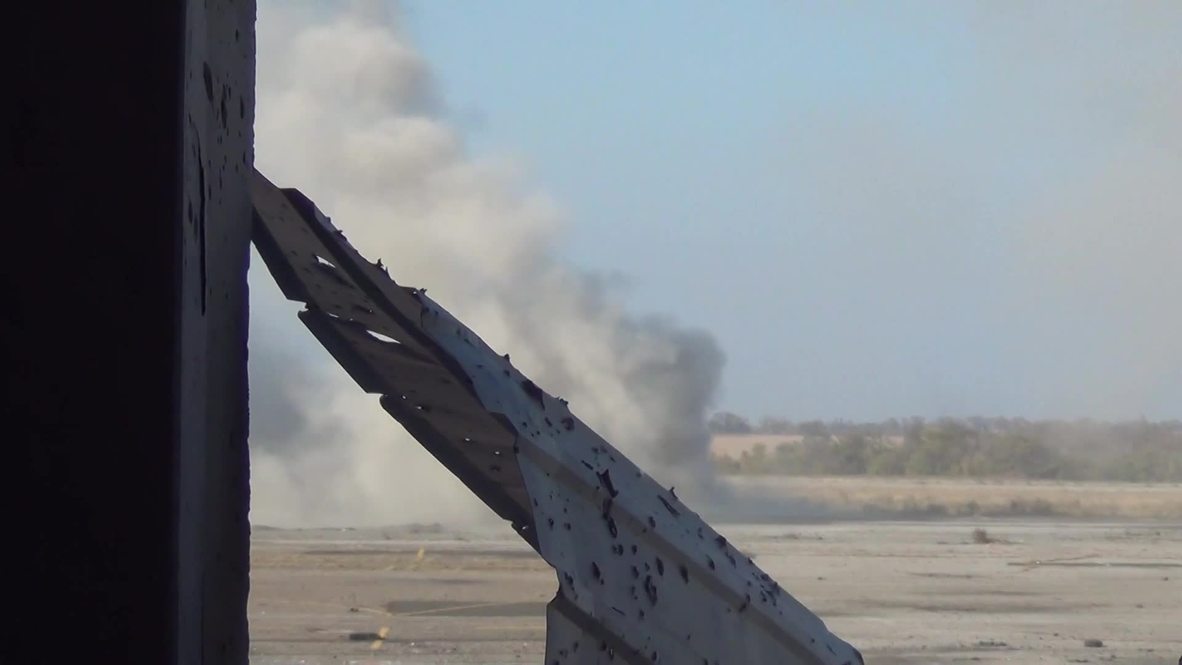 Ukraine: Donetsk airport in ruins as fighting continues despite ceasefire