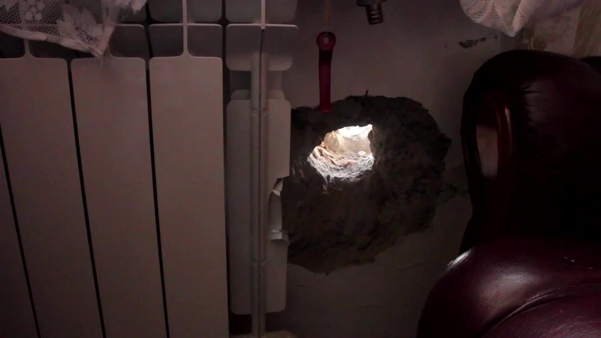 Ukraine: Is this Donetsk’s luckiest couple? Shell pierces through living room without bursting