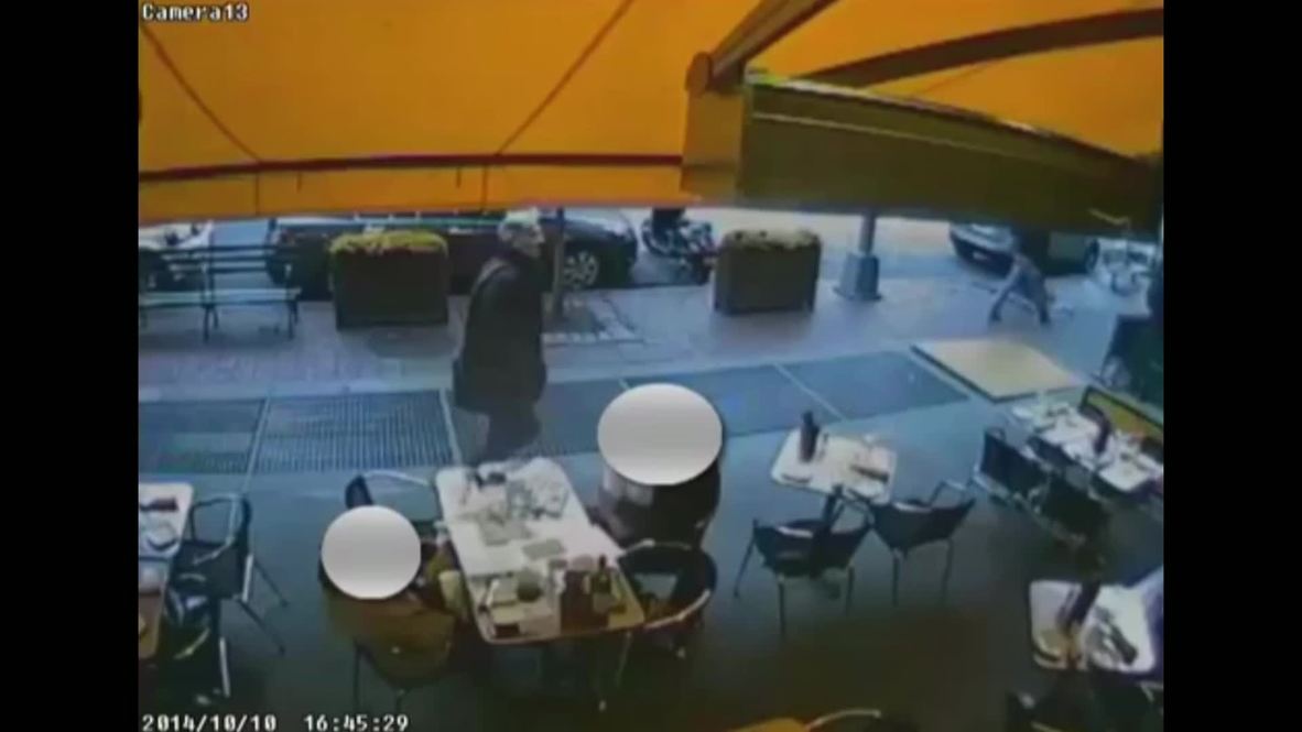 USA: Watch this man throw a SMOKE BOMB at diners from subway hatch