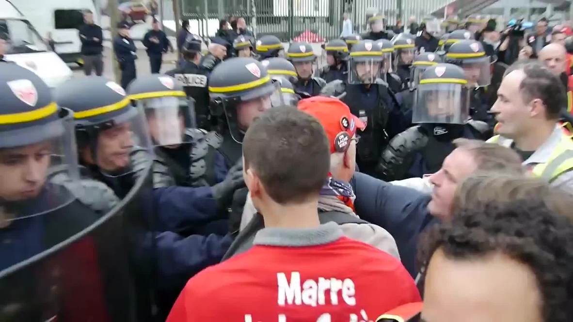 France: Police baton and gas protesting trade unionists at Paris Motor Show