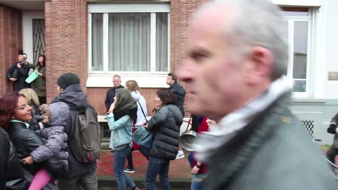 France: Marine Le Pen's Calais visit breaks out in scuffles