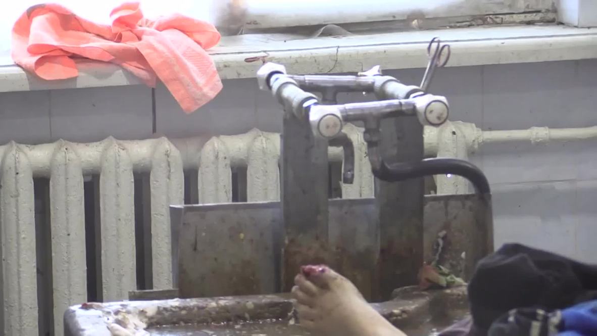 Ukraine: School-boys killed playing football by shelling brought to morgue *GRAPHIC*