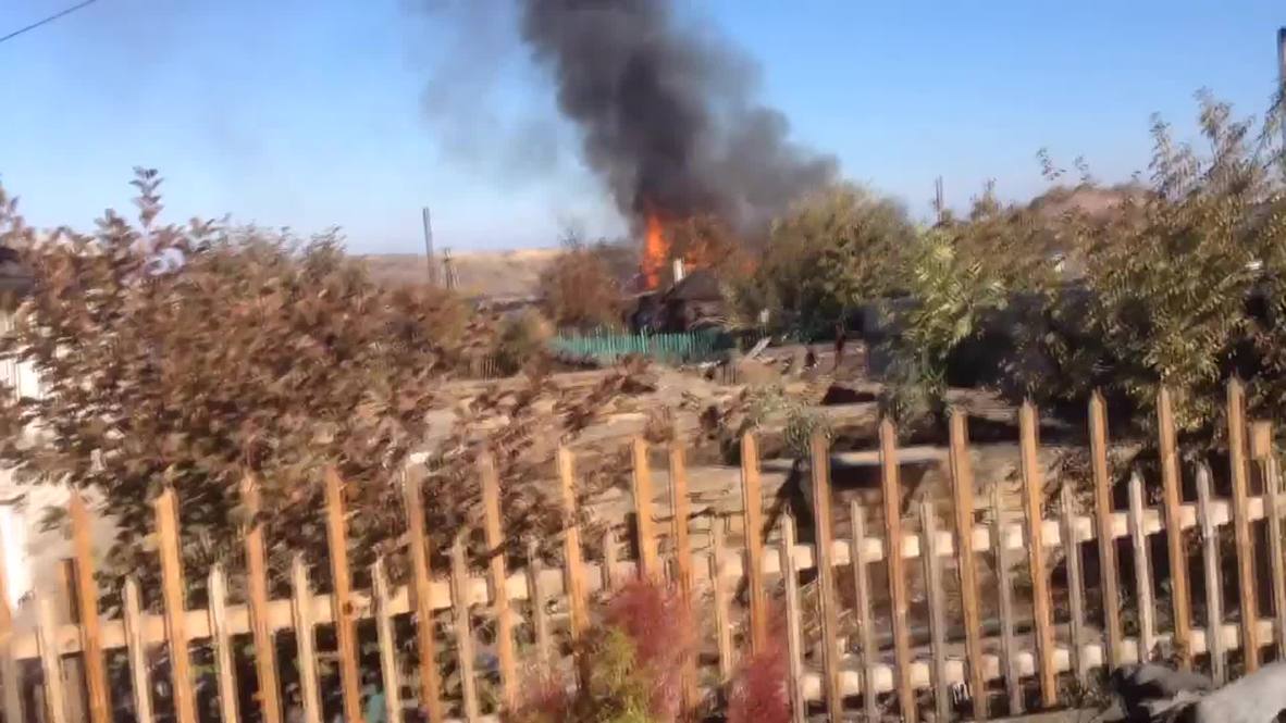 Ukraine: Village in FLAMES after Kiev shelling