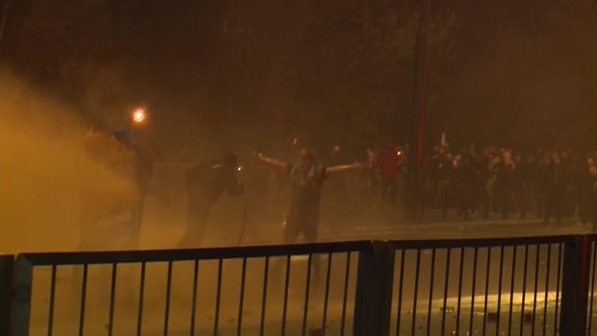 Poland: Nationalists sprayed by water cannon as clashes break out
