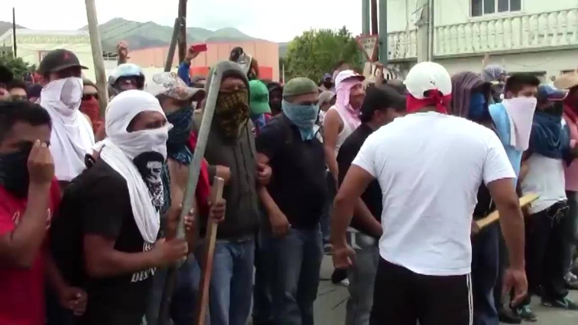 Mexico: See riot squad flee armed protesters in Chilpancingo