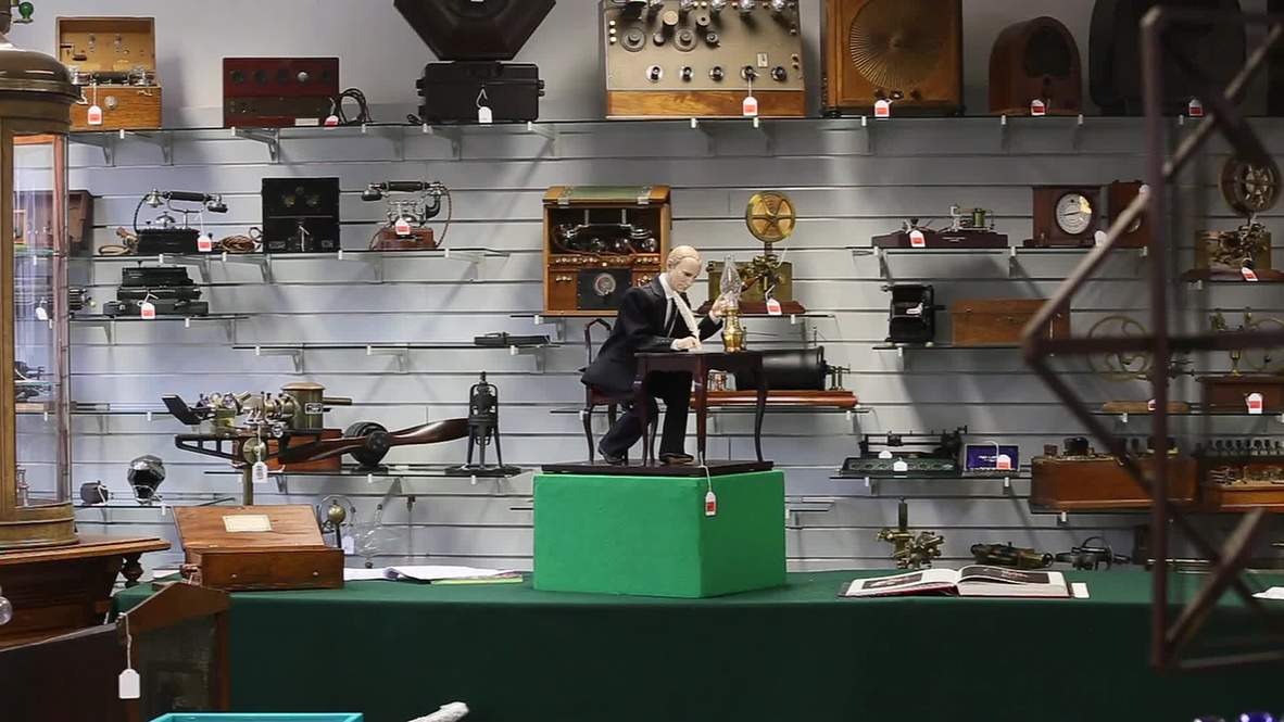 Germany: Putin figurine signing Crimea into Federation sells for €30,000 at auction