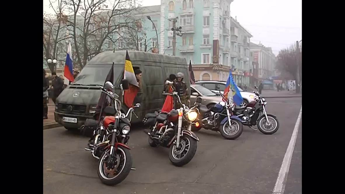 Ukraine: Russia's Night Wolves gang bring aid to a Lugansk village