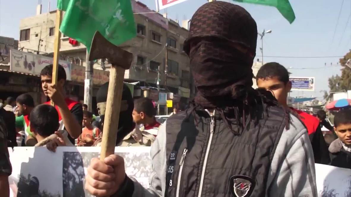 State of Palestine: Men brandish AXES to celebrate synagogue attack