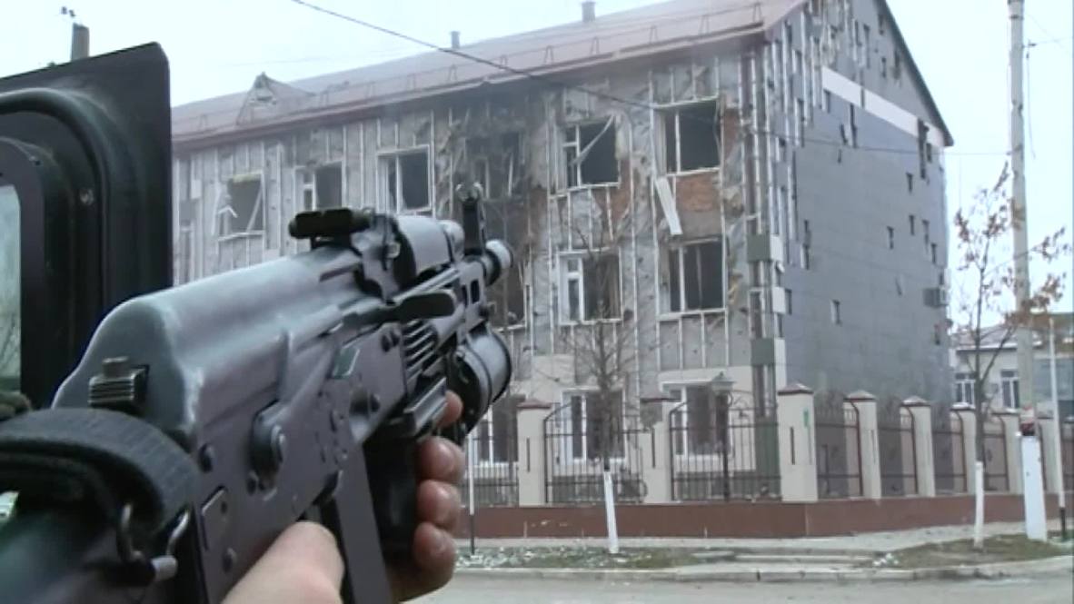 Russia: ROCKET LAUNCHERS fired on Chechen militants in occupied school