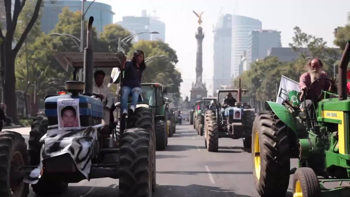 Mexico: See farmers ram Interior Ministry gates with TRACTORS