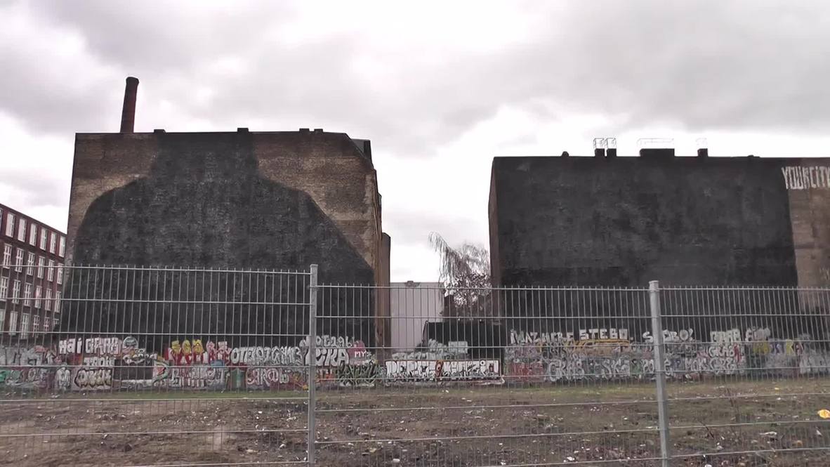 Germany: Iconic Berlin street art covered in black paint