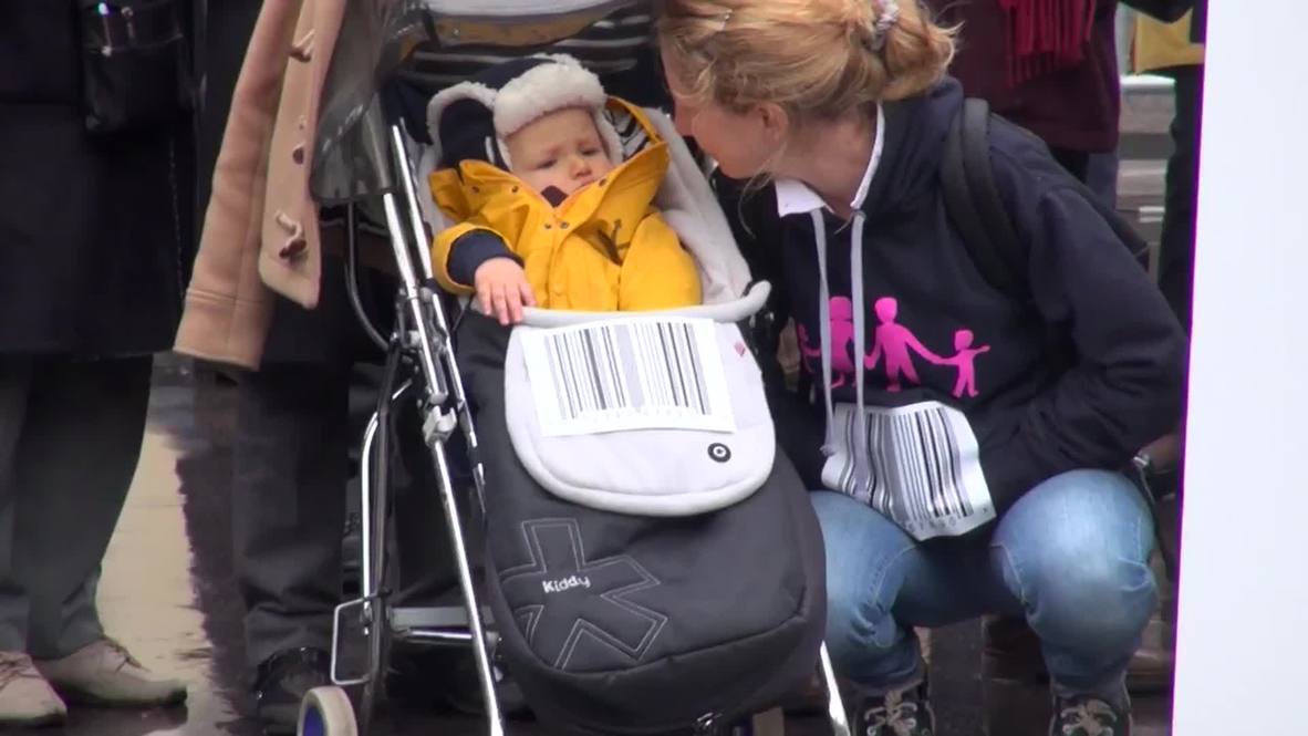 France: Masked 'Manif pour Tous' members rally against surrogacy