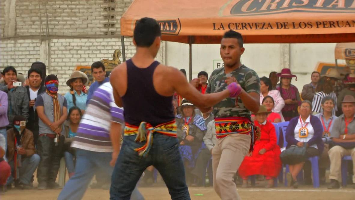 Peru: Kids and adults fight HARD - but it's all just Takanakuy tradition!