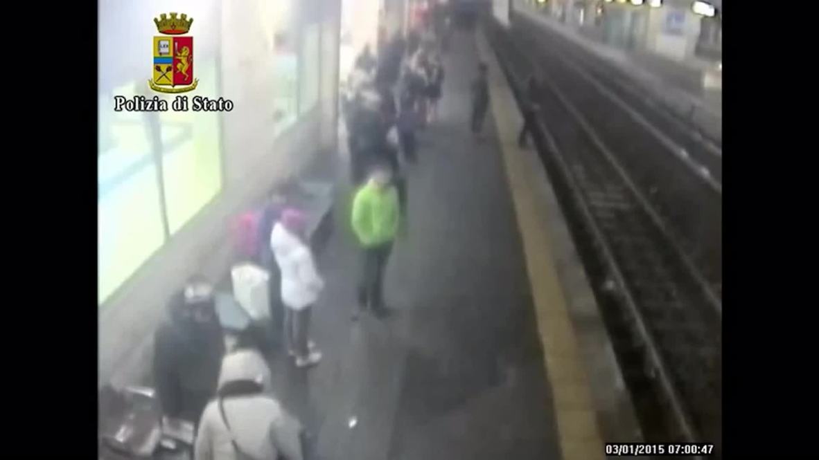 Italy: Off-duty cop saves girl's life after she jumps onto train tracks
