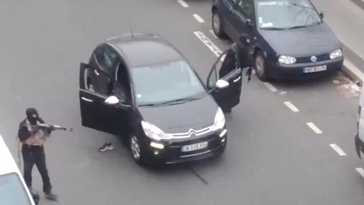 France: Gunmen 'execute' police officer at Charlie Hebdo HQ *GRAPHIC*