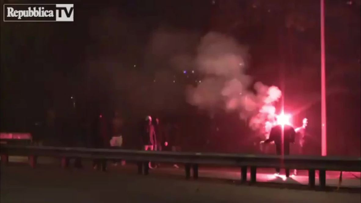 Italy: Rival fans clash in derby day riot in Rome