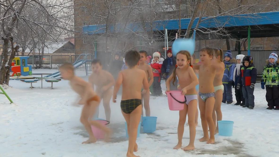 Russia: Cure for your child's cold: pouring water over them in sub-zero temps?
