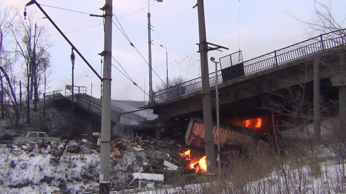 Ukraine: Aftermath of tank battle, Putilovsky bridge destroyed