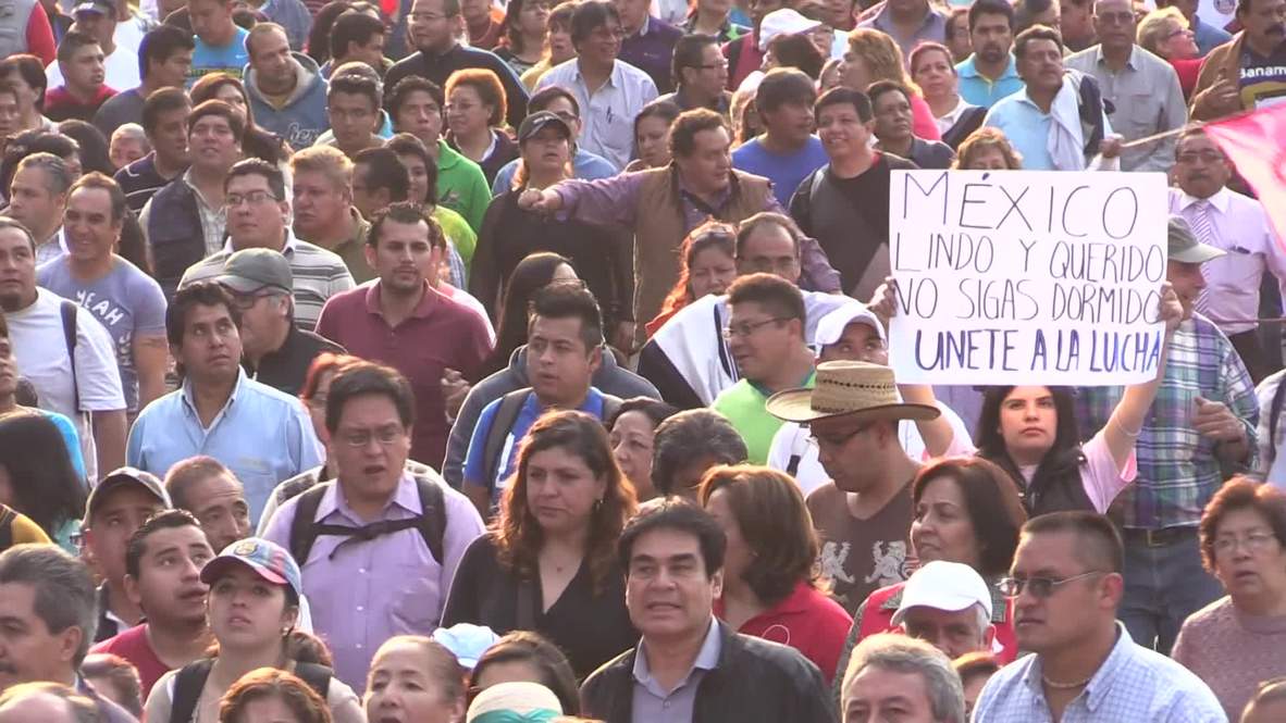 Mexico: 'We want them!' Thousands march for missing 43 in Mexico City
