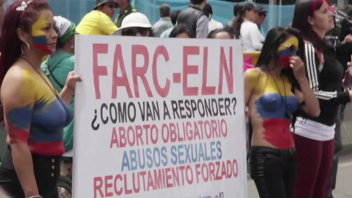 Colombia: Topless women protest sexual abuse at 'March for Life' *EXPLICIT*
