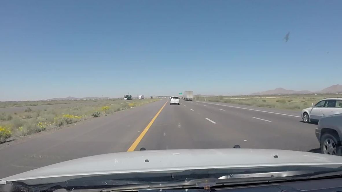 USA: See huge bales of marijuana fly into police car