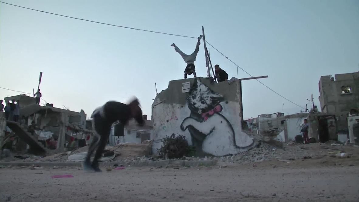 State of Palestine: See Gazans practise parkour around Banksy's street art