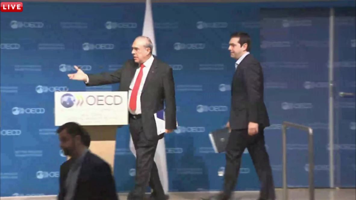 France: Greek PM Tsipras hopes OECD helps build "mutual trust" between Greece and EU