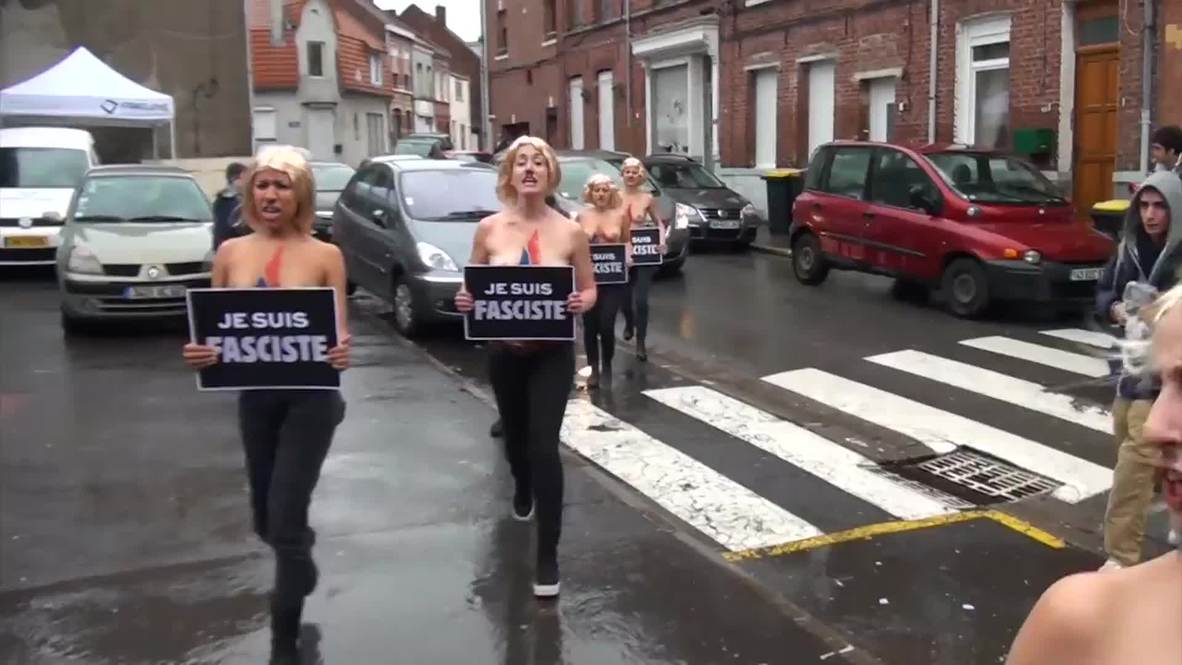 France: Topless FEMEN chant anti-Nazi song against Le Pen *EXPLICIT*