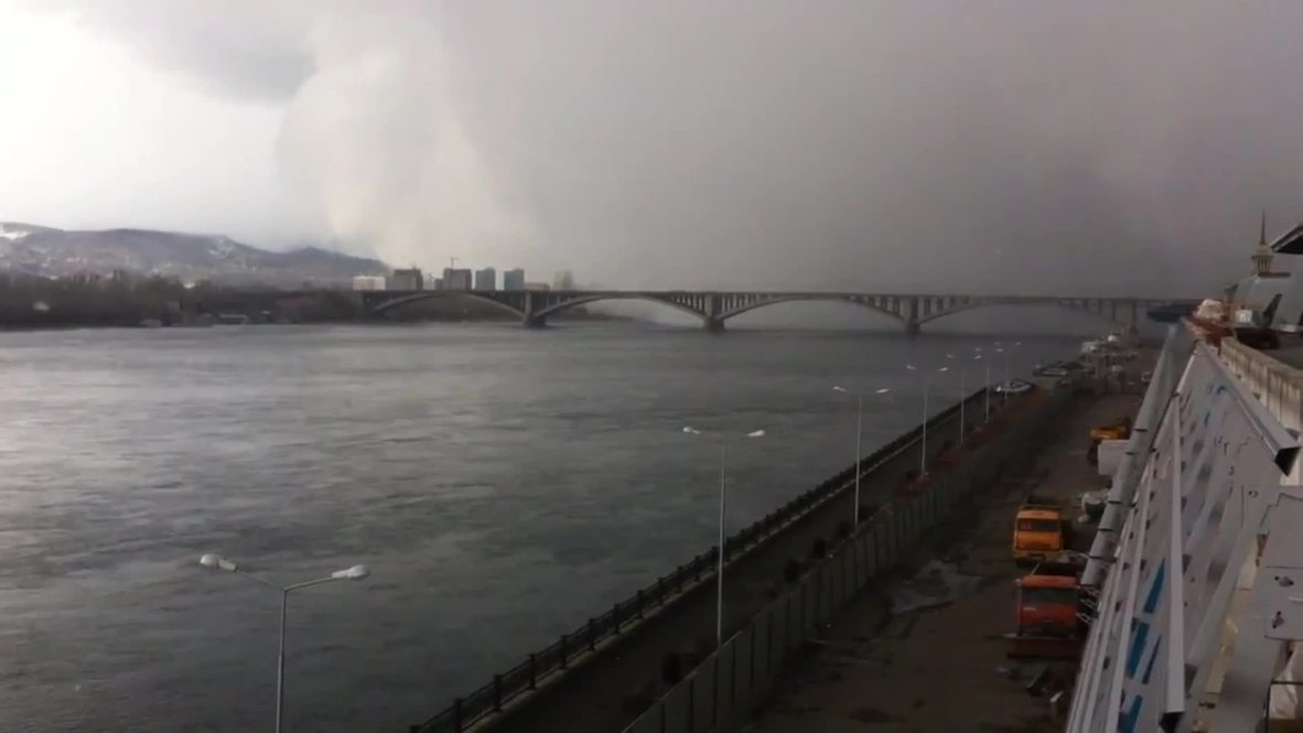 Russia: Watch this massive snow cloud hide a bridge in seconds