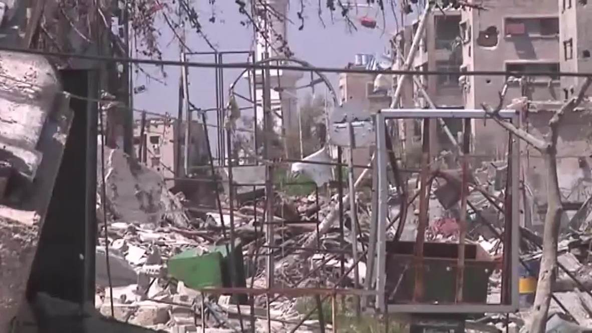 Syria: Yarmouk refugee camp lies in ruins as 'IS' advances