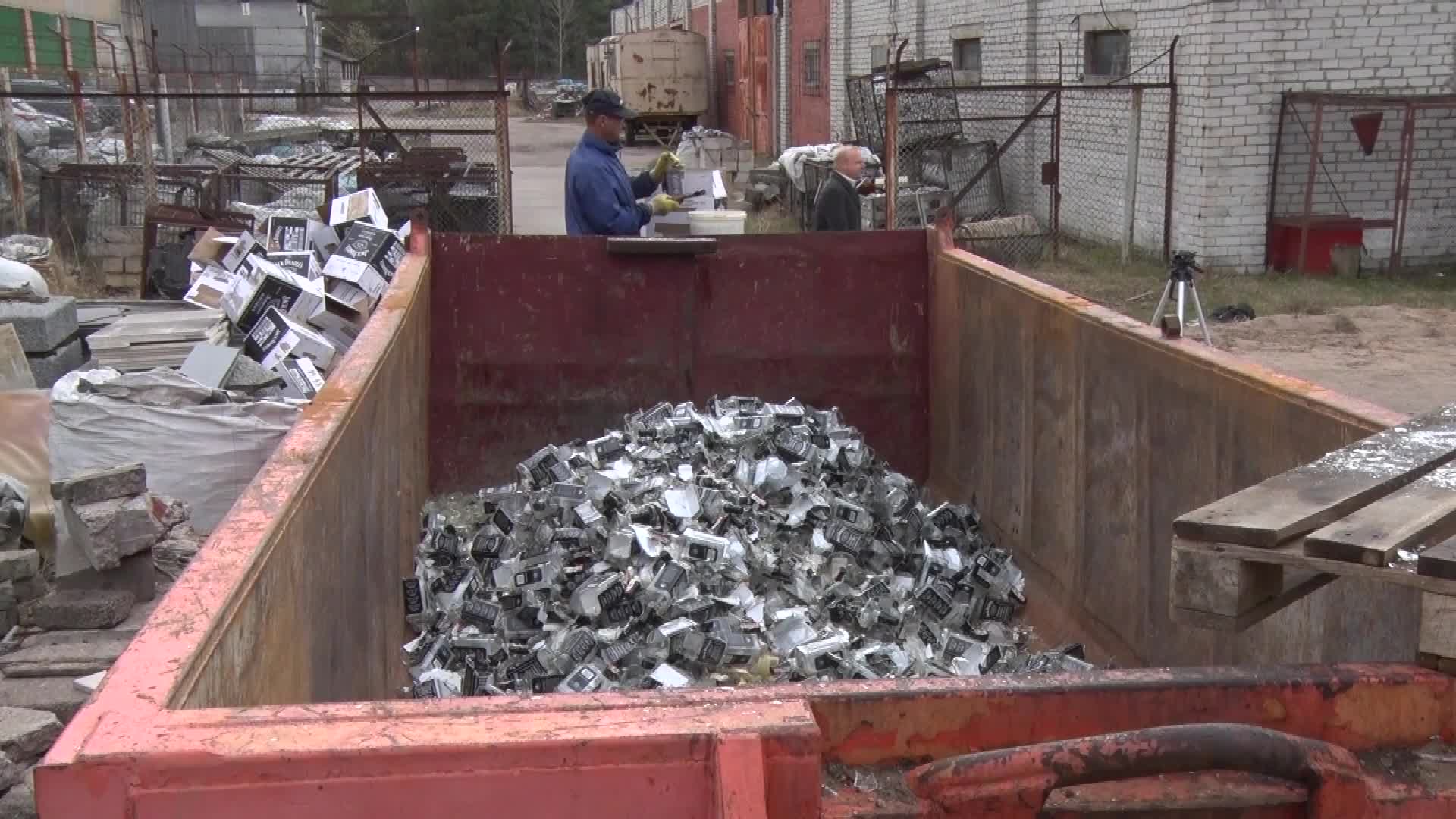 Latvia 1,800 bottles of 'counterfeit' liquor destroyed in Riga Video