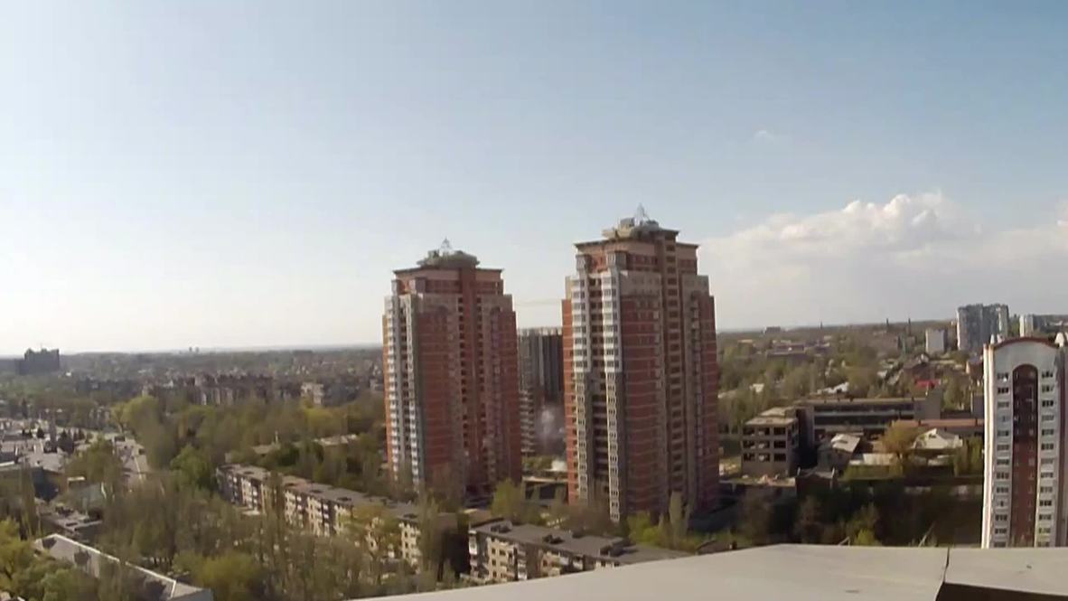 Ukraine: Smoke rises in Donetsk's Kievsky residential district