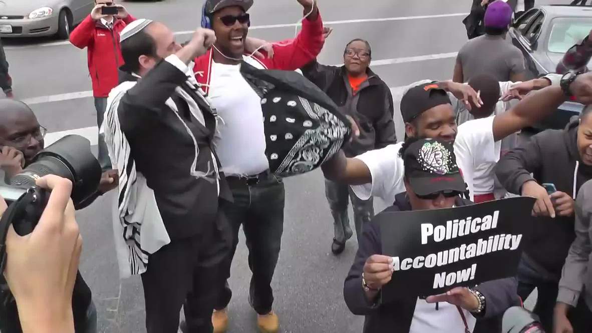 USA: Street celebrations in Baltimore after six officers charged in Freddie Gray case