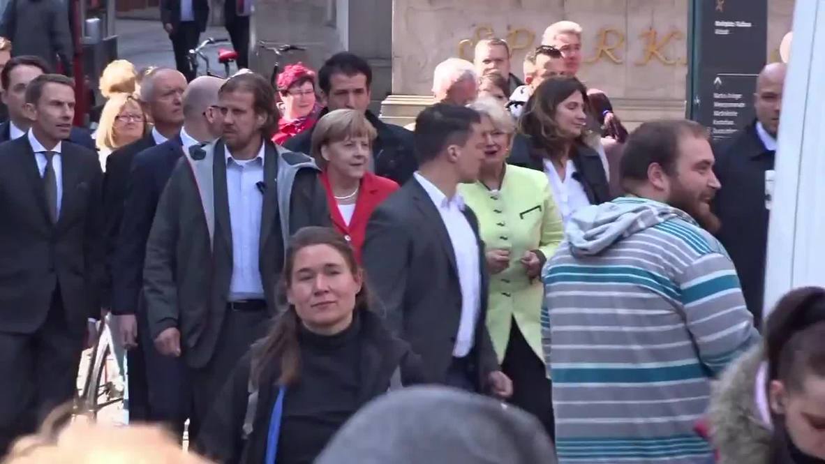 Germany: Merkel heckled by Die Partei protesters at CDU election event