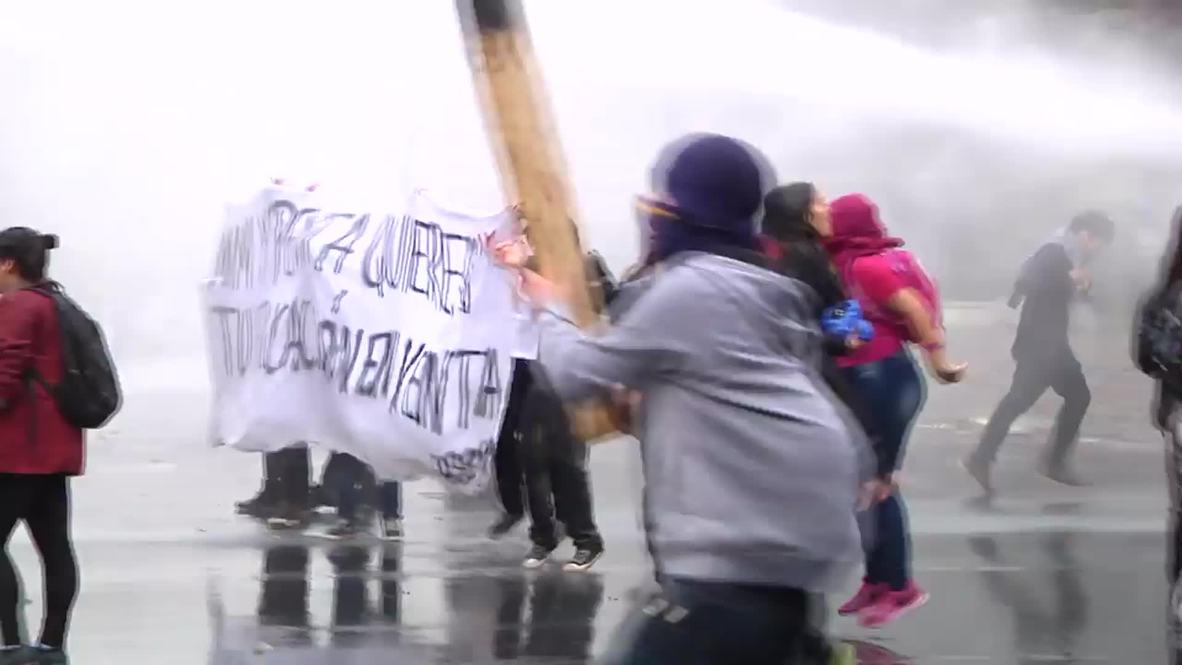 Chile: Police fire water cannon at high-schoolers as Santiago erupts in violence
