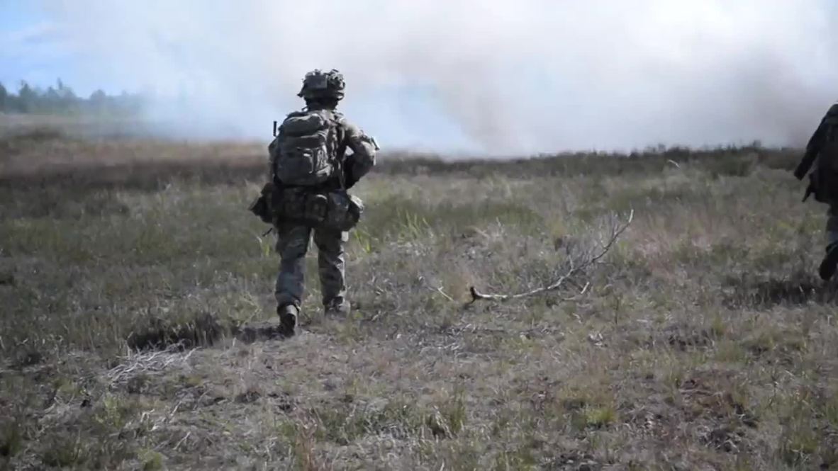 Latvia: British Gurkha riflemen show their fighting skills in NATO manoeuvres