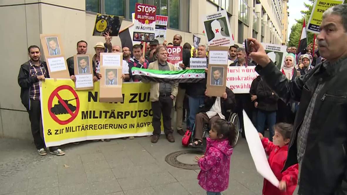 Germany: Protesters demand Germany release Al Jazeera reporter Ahmed Mansour