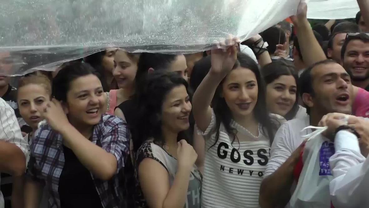 Armenia: Shower of rain doesn't stop utility protests in Yerevan