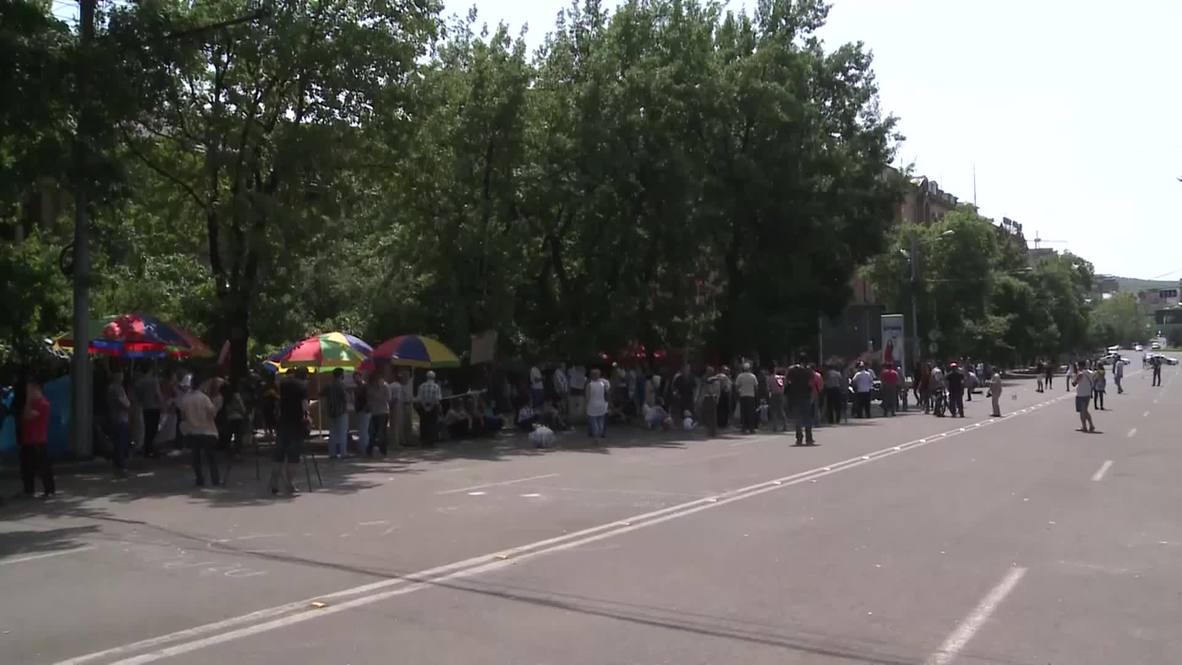Armenia: Utility protesters play football in Yerevan's barricaded streets