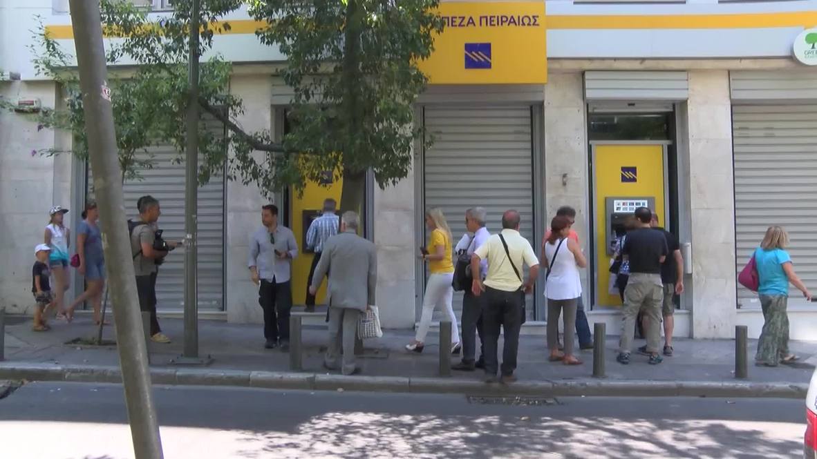 Greece: Athenians queue at ATMs after capital controls put in place