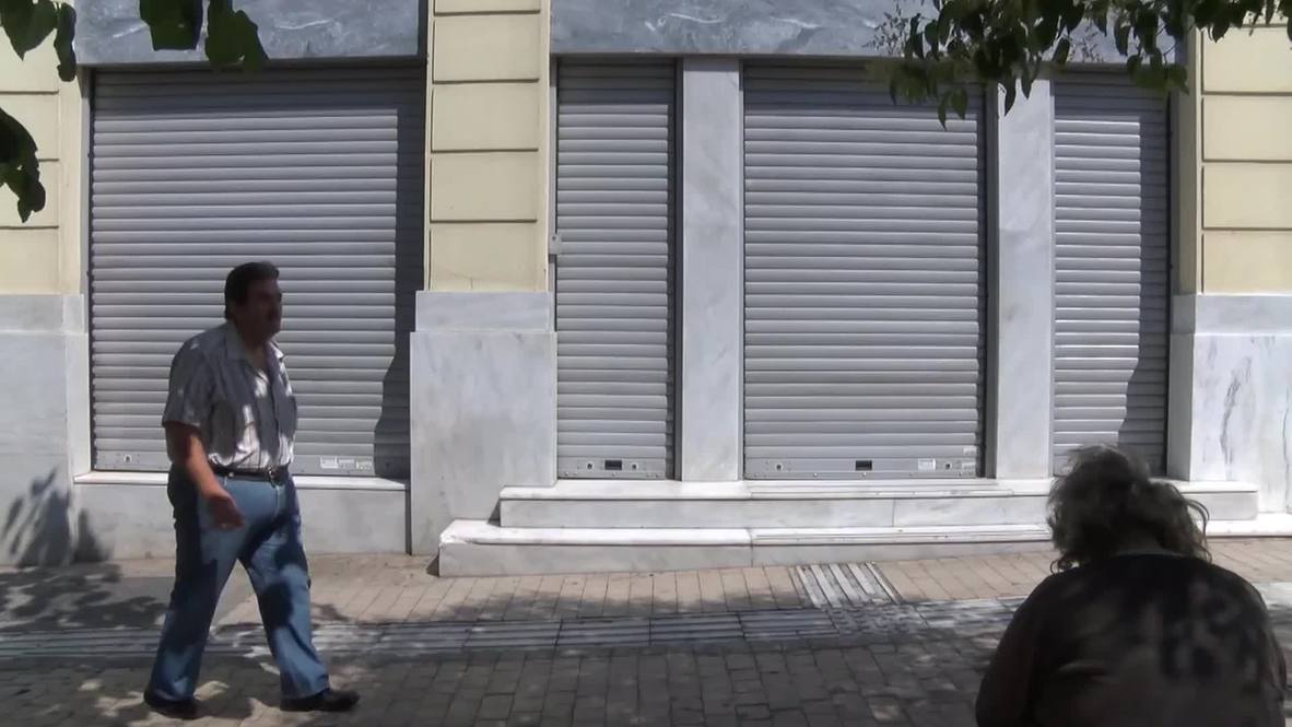 Greece: Athenians queue for cash on day two of bank closures