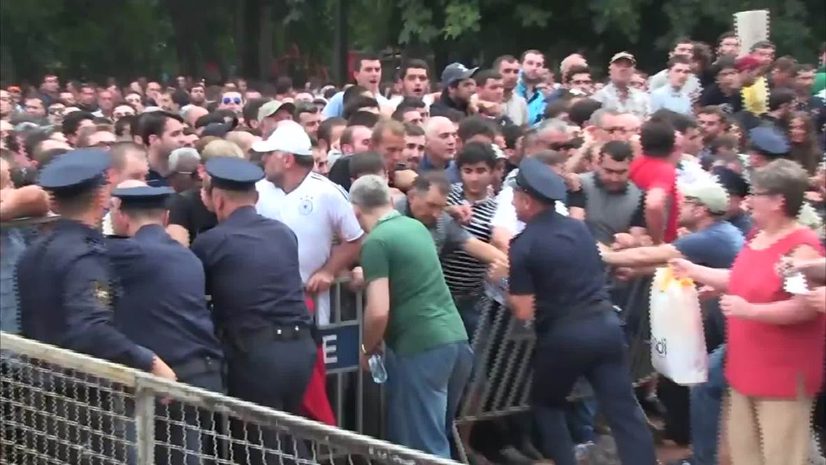 Georgia: Football fans scuffle with police in rush to buy UEFA Super Cup tickets
