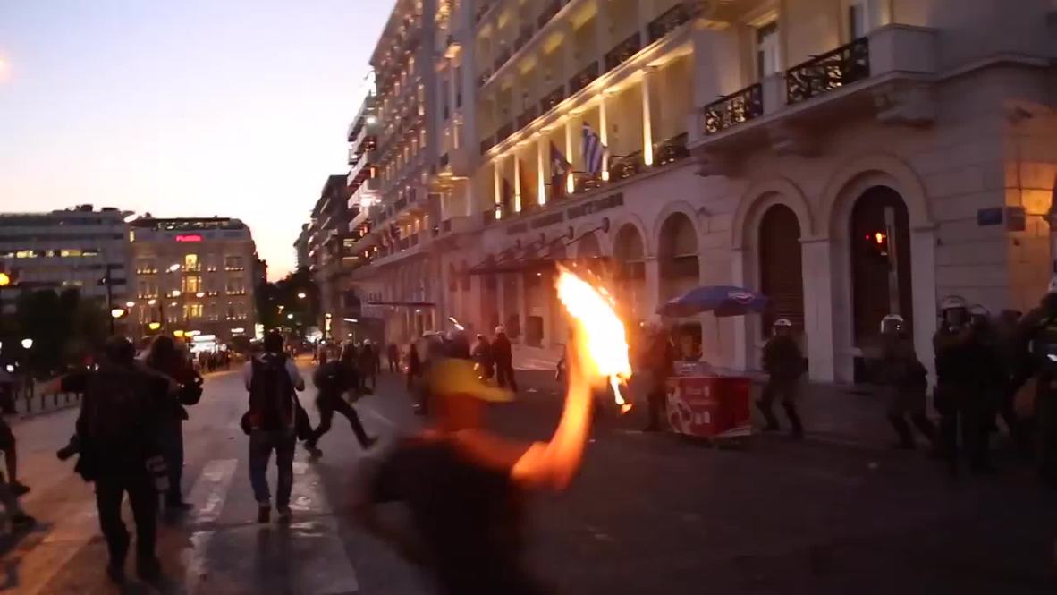 Greece: Police pelted with MOLOTOV COCKTAILS as parliament votes on debt deal
