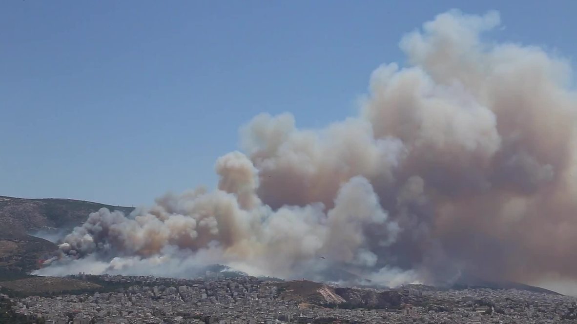 Greece: Wildfires in Athens threaten homes