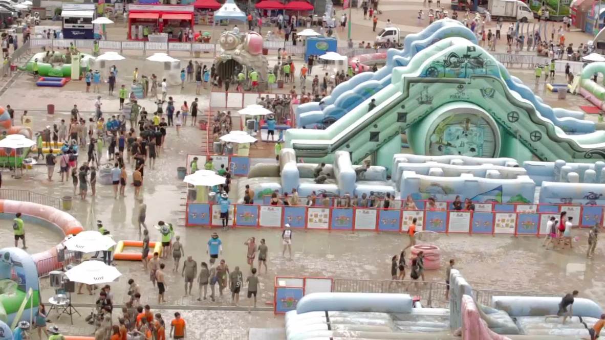 South Korea: Tourists and locals get dirty at mud festival