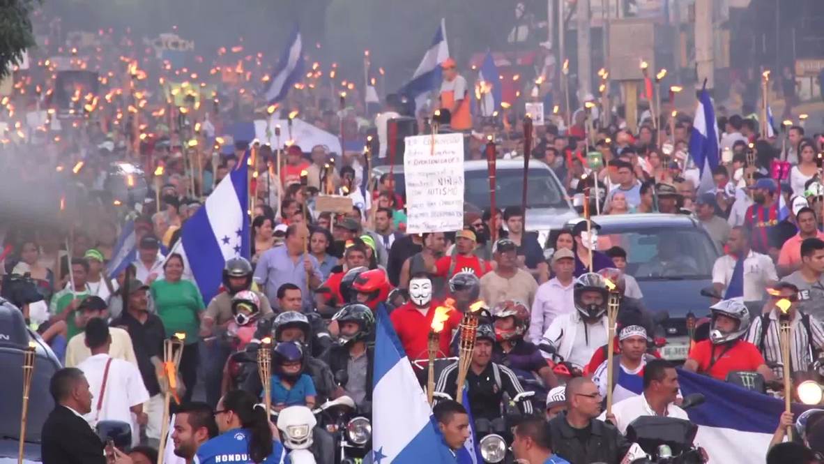 Honduras: Thousands flood streets for torch-lit rally against US interference