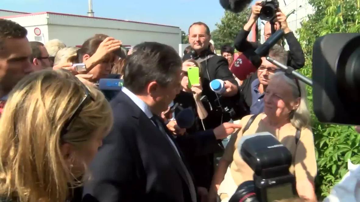 Germany: Vice-Chancellor Gabriel slams anti-refugee violence during visit to attacked shelter